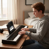 88 keys piano keyboard in black with French DREAM audio source, ideal for music lessons and family entertainment.