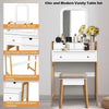 Vanity table set with cushioned stool, large mirror, and three drawers for organized cosmetic storage in white finish.