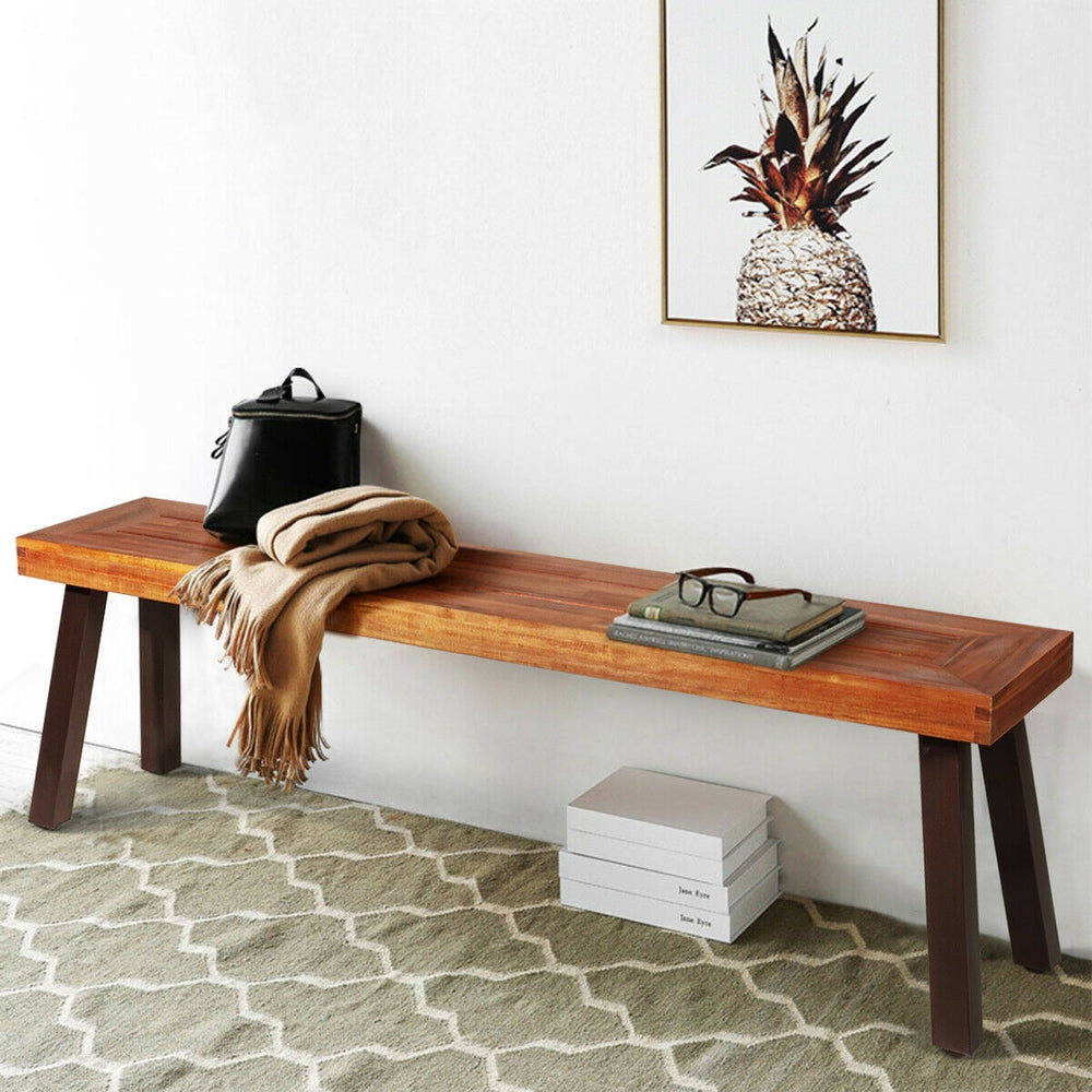 Acacia wood dining bench with steel legs, showcasing a natural finish, perfect for outdoor or indoor use.