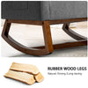Rocking high back upholstered lounge armchair with rubberwood legs, featuring a side pocket for convenient storage.