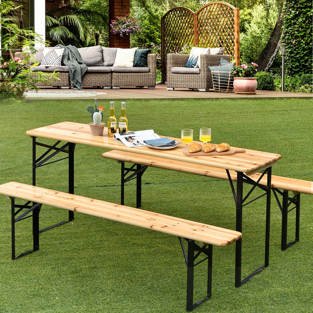 Folding wooden picnic table and benches set with natural wood grain, ideal for indoor and outdoor use.