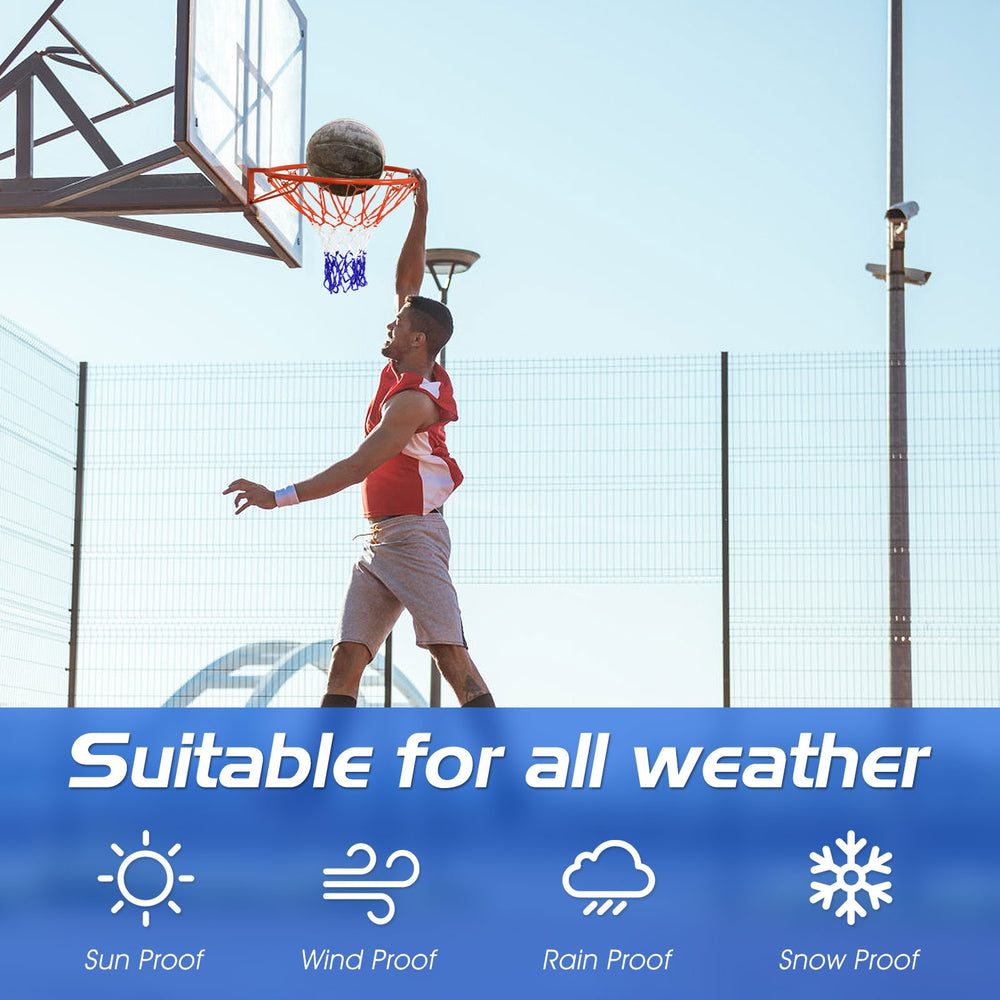 Action shot of a player dunking on an 18-inch red basketball rim with all-weather net, showcasing its robust design.