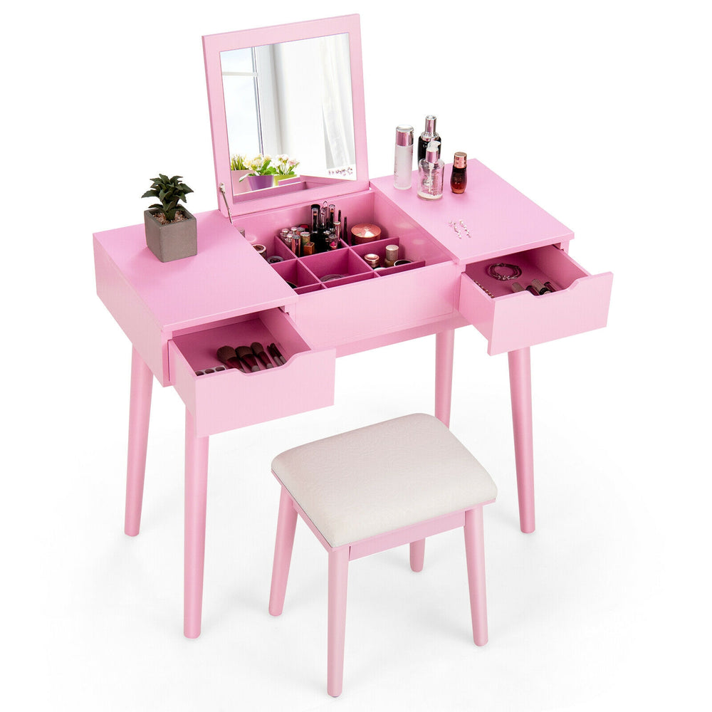 Pink makeup vanity table set with flip top mirror, two drawers, and padded stool for stylish bedroom organization.