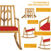 Patio acacia wood rocking chair with red cushion, featuring a high backrest and sturdy rocking base for outdoor.