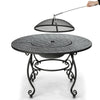 Round 35.5-inch patio fire pit dining table with cooking BBQ grate and mesh spark cover for outdoor gatherings.