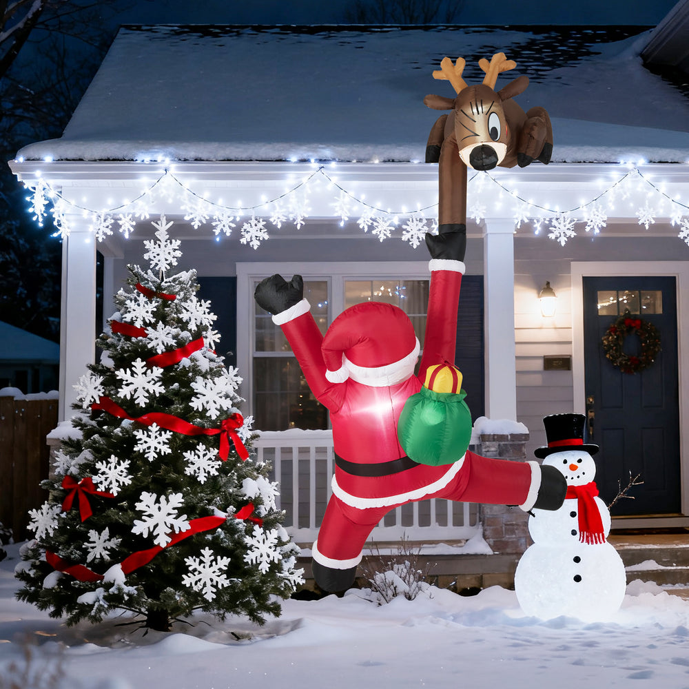 Climbing Santa Claus inflatable with reindeer, 8.5 feet tall, featuring LED lights for festive outdoor Christmas decor.