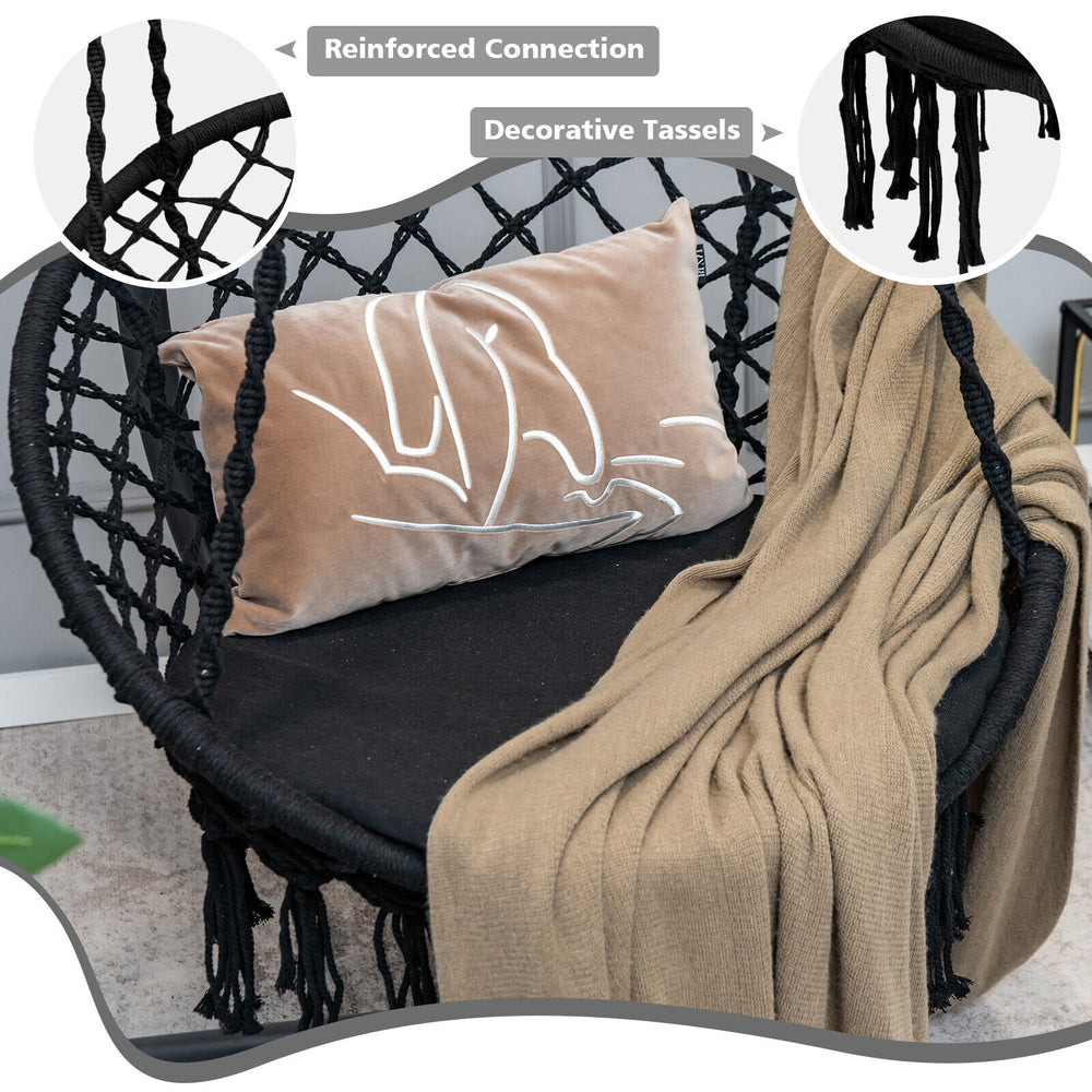 Cushioned black hammock swing chair with decorative tassels, inclined backrest, and soft padded cushion for ultimate.