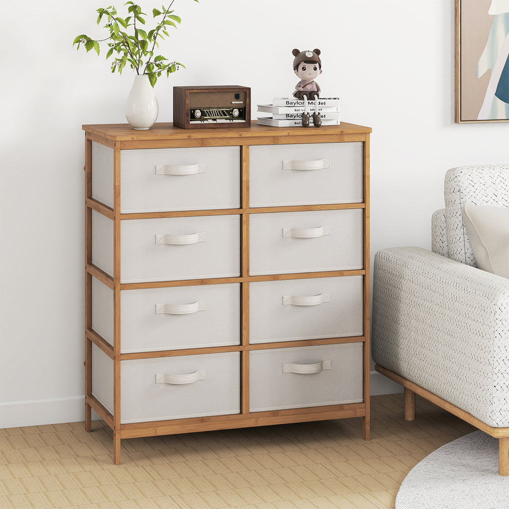 8-drawer dresser with removable beige fabric bins and sturdy bamboo frame, perfect for bedroom organization.