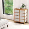 8-drawer dresser featuring a spacious top and removable beige fabric bins, designed for stylish organization in.