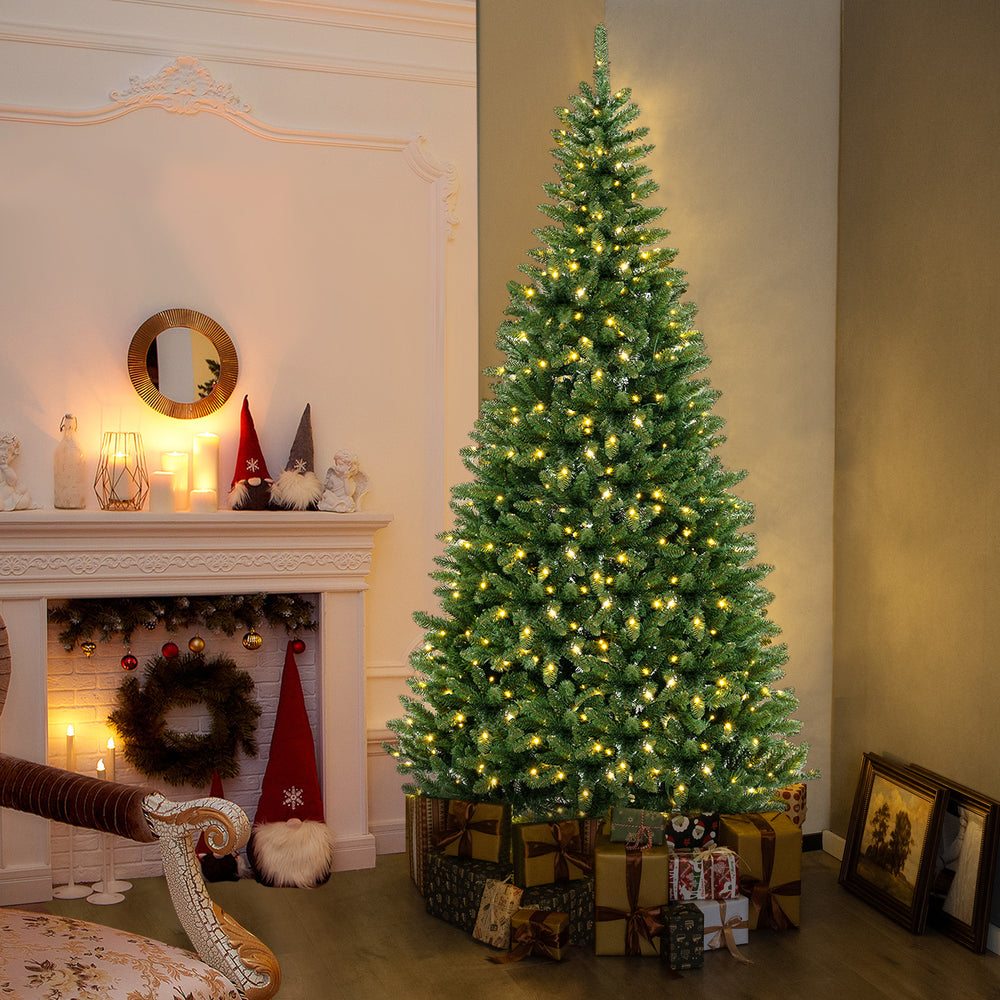 8 FT corner artificial Christmas tree with warm white LED lights, showcasing its lush branch tips and perfect for cozy.