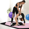 Folding gymnastics mat in black and pink, featuring high-density foam, ideal for fitness and kids' activities.
