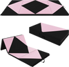 Folding gymnastics mat in black and pink, made of PU leather, featuring hook and loop fasteners for versatile use.