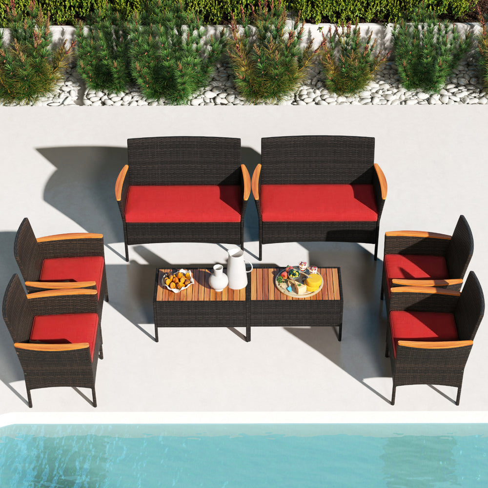 8-piece patio wicker sofa set featuring 4 rattan chairs and 2 loveseats with red cushions, perfect for outdoor.