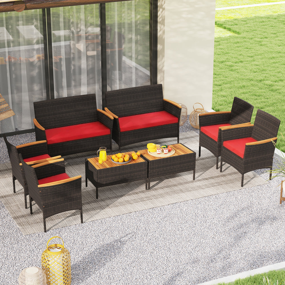 8-piece patio wicker sofa set featuring 4 rattan chairs and 2 loveseats with red cushions, ideal for outdoor relaxation.