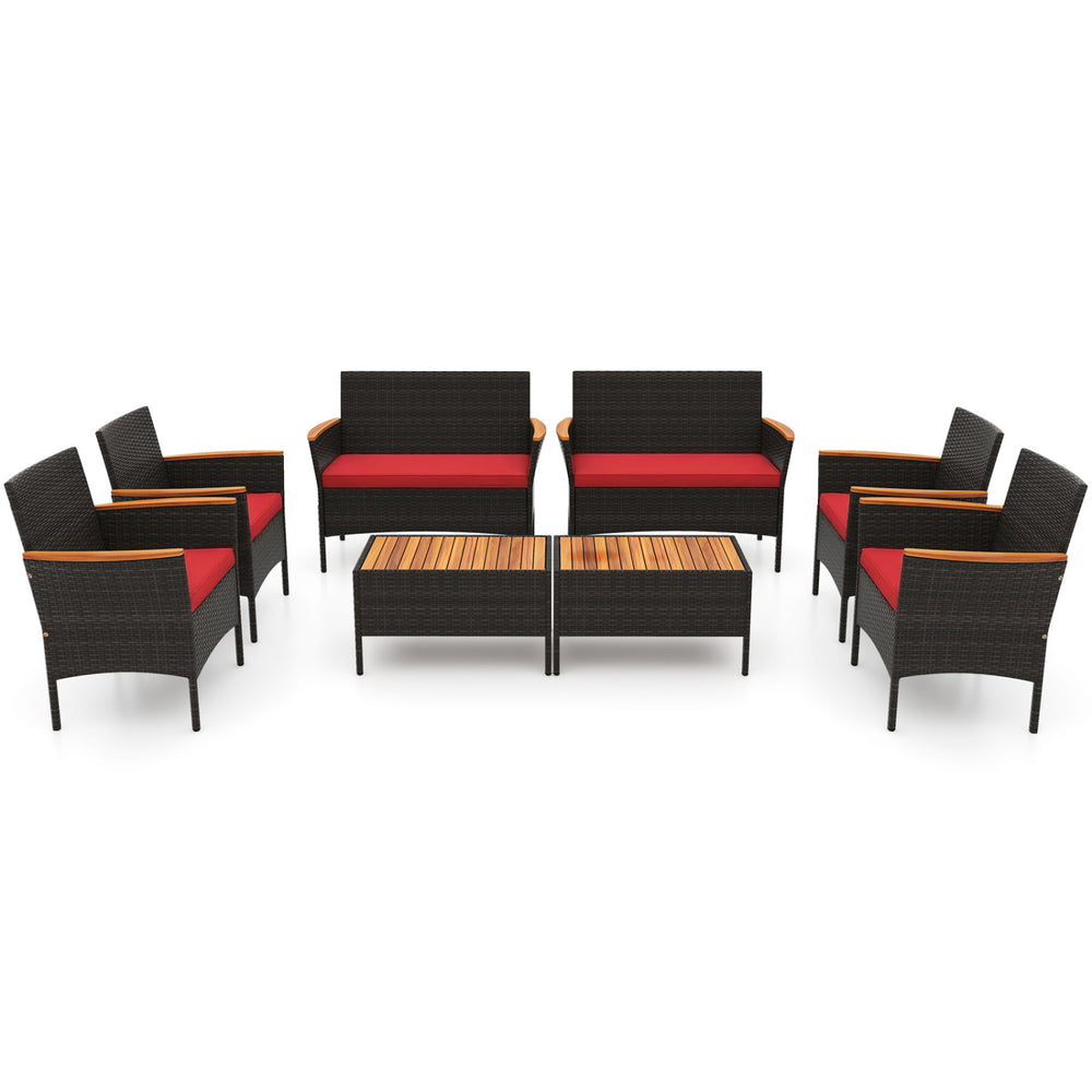 8-piece patio wicker sofa set featuring 4 rattan chairs and 2 loveseats with red cushions and acacia wood accents.