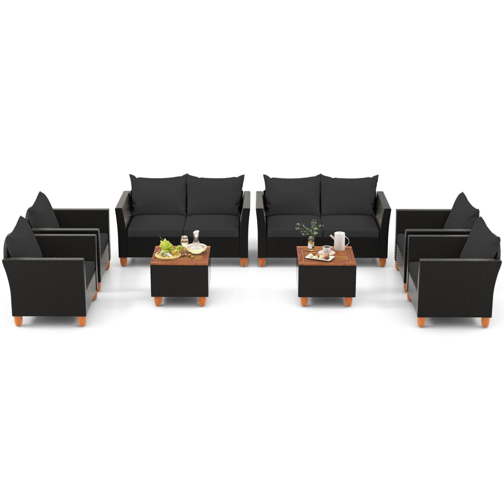 Outdoor conversation set featuring 8 pieces of black PE rattan furniture with soft cushions and a storage coffee table.