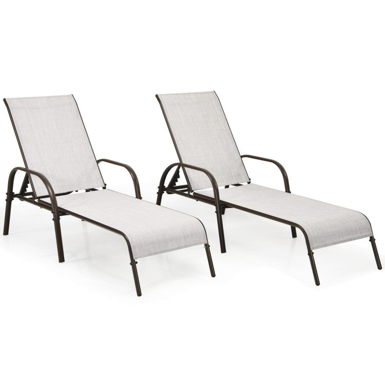 Two adjustable lounge chairs with PE rattan and powder-coated steel frames, perfect for outdoor relaxation.