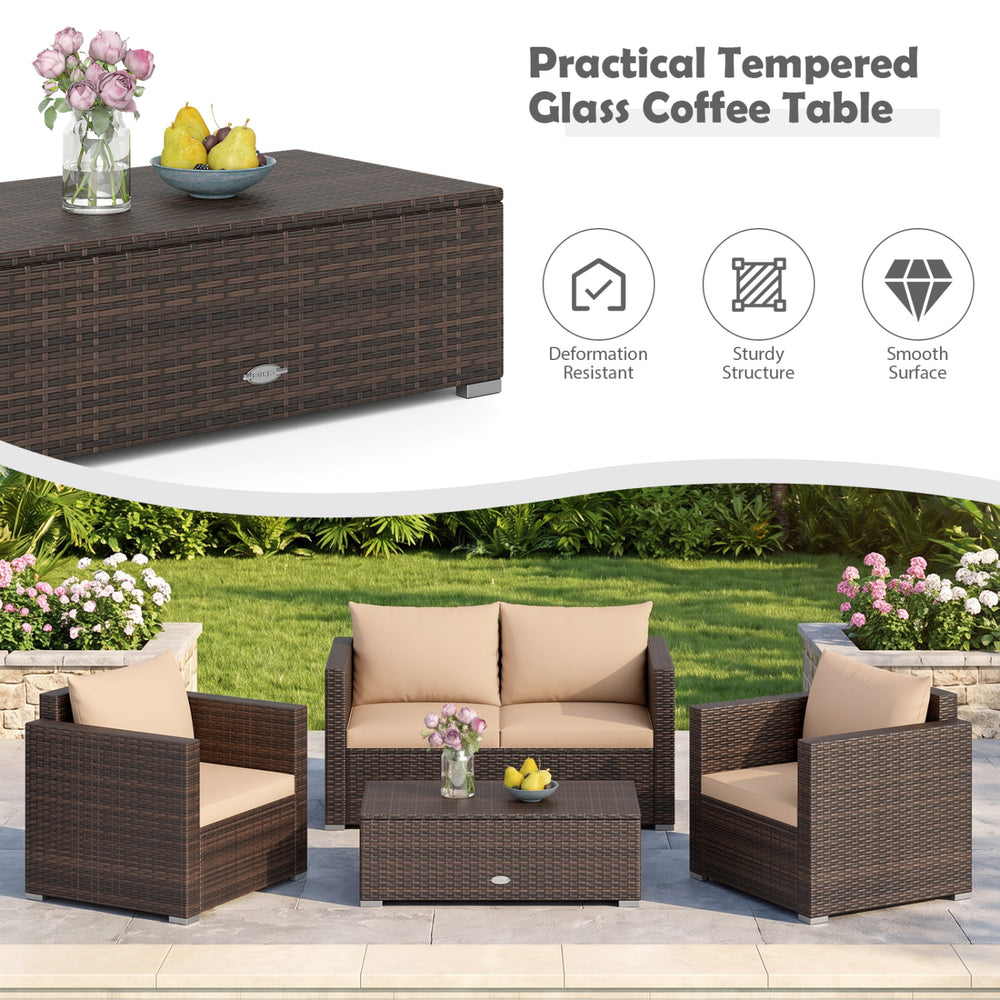 Brown rattan coffee table with tempered glass surface, part of an 8-piece patio conversation set for outdoor relaxation.