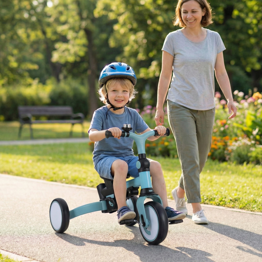 Kids tricycle in blue with adjustable features, removable canopy, and parent push handle for outdoor fun.