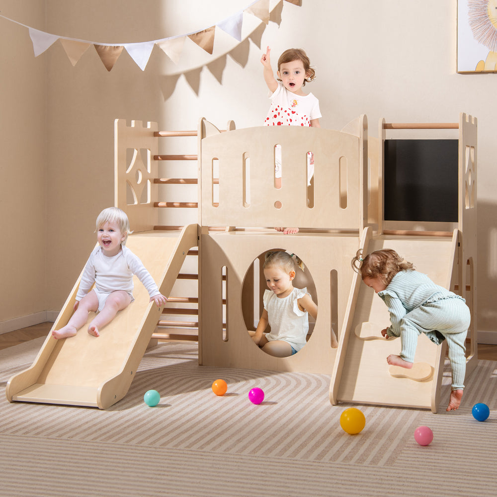 Wooden 8-in-1 toddler slide playground with climber, chalkboard, and tunnels for creative indoor play and exploration.