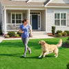 Woman jogging with a golden retriever on a lush 8 x 5 feet artificial turf rug, ideal for pet areas and easy upkeep.