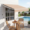 Retractable 8 x 6.6 feet beige patio awning with manual crank, providing UV protection and a stylish wavy edge for outdoor spaces.