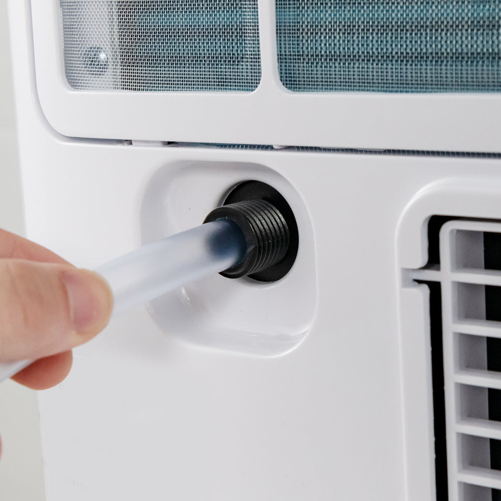 Close-up of the drainage hole on the 3-in-1 9000 BTU air conditioner for easy maintenance and installation.