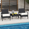 Black rattan coffee table with tempered glass top and adjustable foot pads, perfect for drinks and snacks by the.