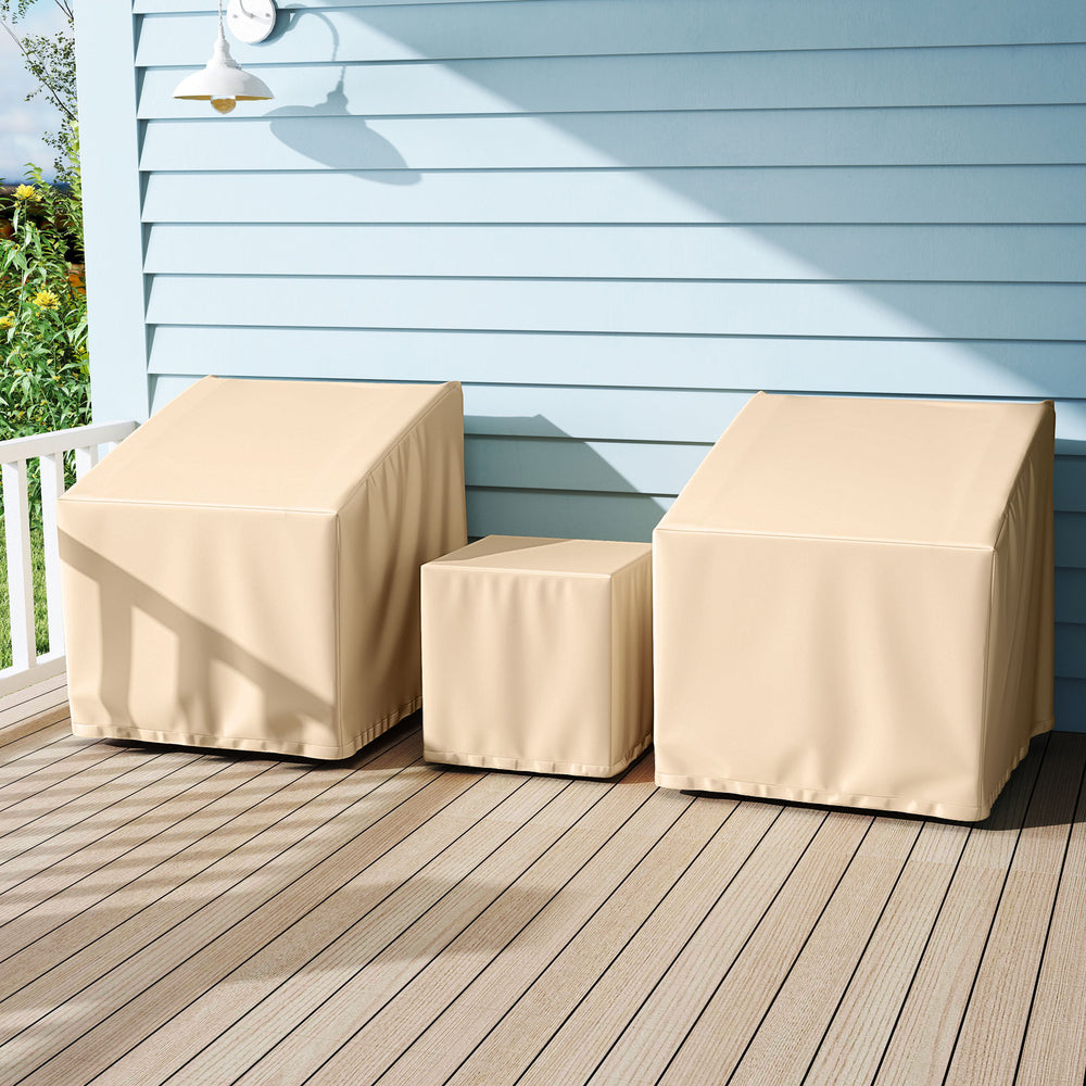 Beige waterproof patio furniture covers for a 3-piece bistro set, featuring elastic hem cord for a secure fit.