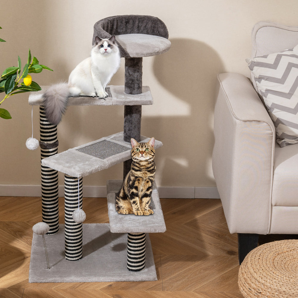 Cat tree with three platforms, plush fabric, and sisal scratching posts, perfect for multi-pet play and lounging.