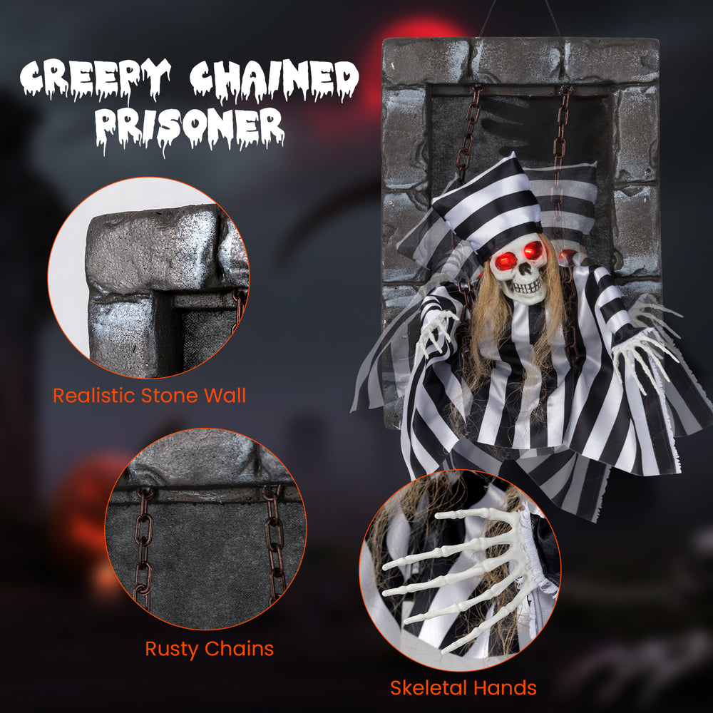 Animated 18-inch hanging skull prisoner with realistic chains, LED eyes, and creepy sound effects for Halloween decor.