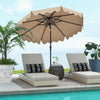 Patio umbrella with crank handle and push button tilt, brown canopy, providing sun protection by the poolside.