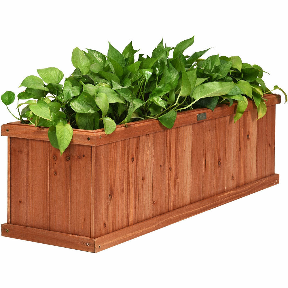 Wooden decorative planter box made of natural fir, featuring a long design with plants, ideal for indoor or outdoor use.