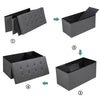 Foldable dark gray fabric storage ottoman with removable bin, featuring a padded seat and spacious interior for.