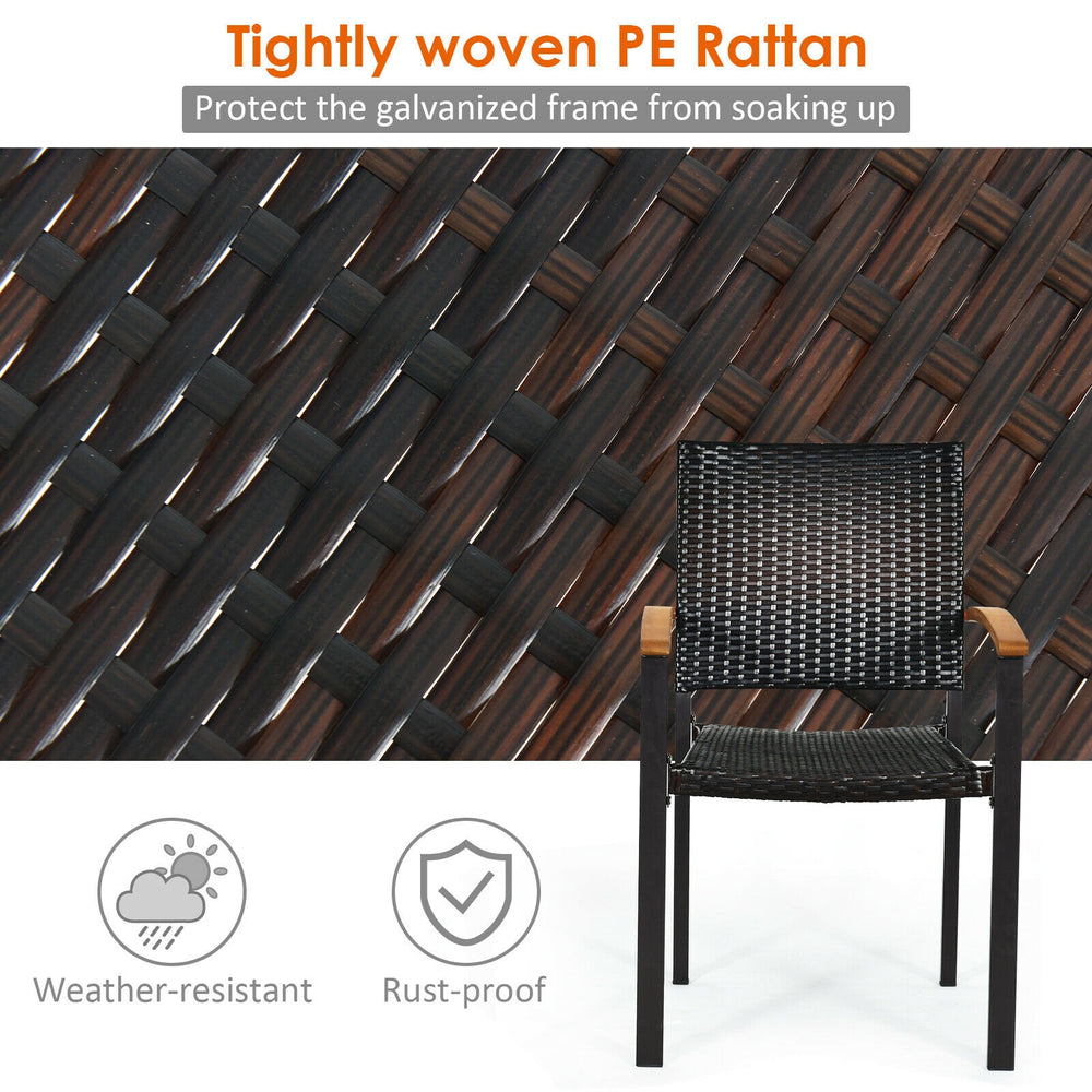 Close-up of tightly woven PE rattan on a patio dining chair with acacia wood armrests, ideal for outdoor use.