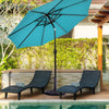 Heavy-duty 30lbs patio umbrella base with decorative bronze finish, securely holding an umbrella by the poolside.