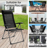 Black portable patio folding dining chair with adjustable headrest, ideal for poolside, backyard, or dining room use.