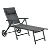 Gray patio lounge chair with wheels, adjustable backrest, neck pillow, and foldable design for easy outdoor relaxation.