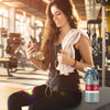 Gray 44oz vacuum insulated stainless steel sports water bottle with portable handle, perfect for hydration on the go.
