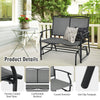Gray iron patio rocking chair with comfortable backrest and curved armrests, perfect for outdoor relaxation.