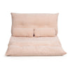Beige 6-position adjustable sleeper lounge couch with two pillows, featuring a foldable design for versatile use.
