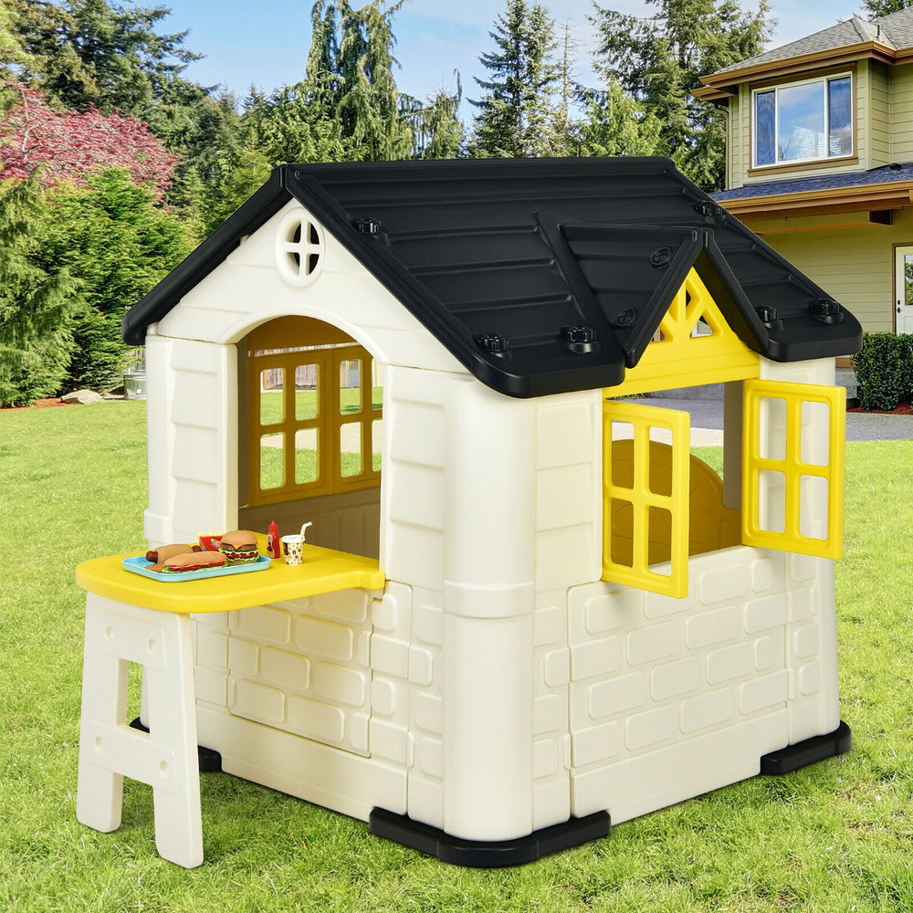 Kid’s playhouse with yellow accents, made from durable HDPE, features open doors and windows for indoor and outdoor fun.
