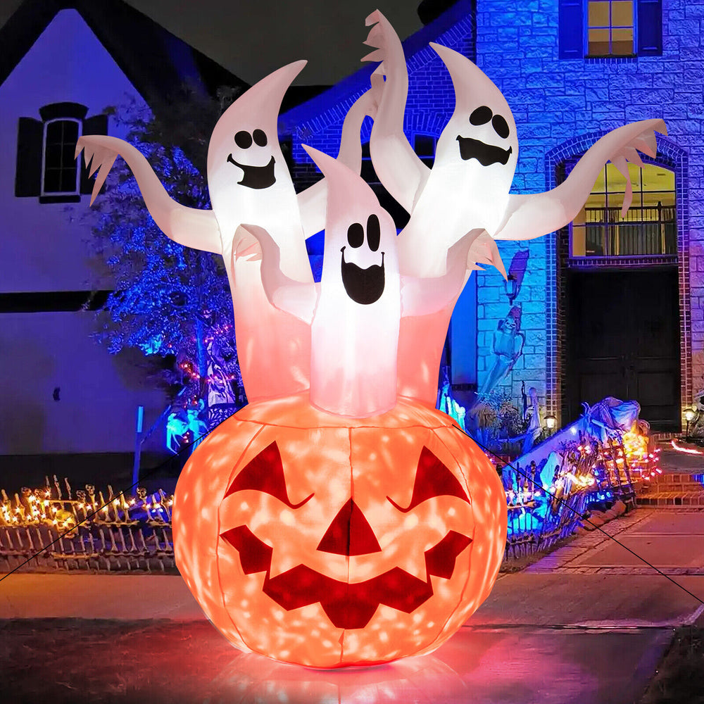 Halloween inflatable decoration showing three ghosts rising from a pumpkin, designed for festive outdoor displays.