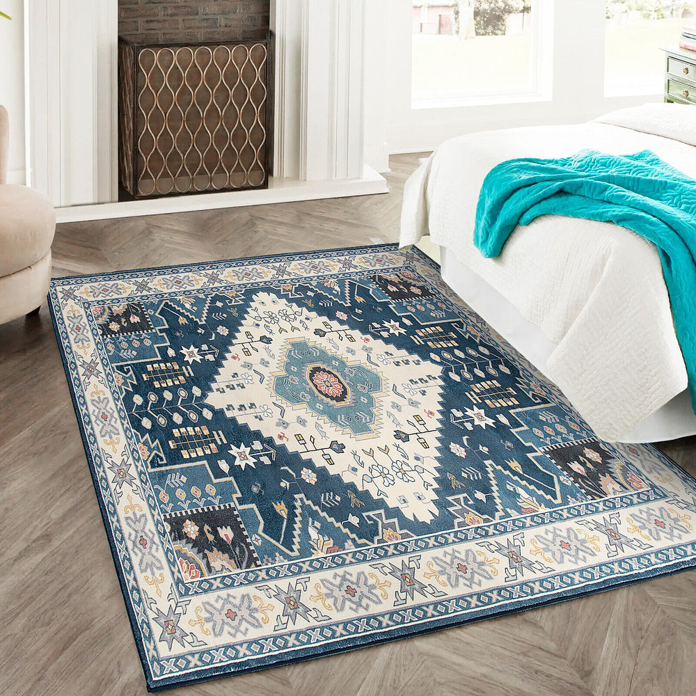 Faux wool area rug with intricate blue pattern, 0.4" thick, ideal for living room or bedroom decoration.