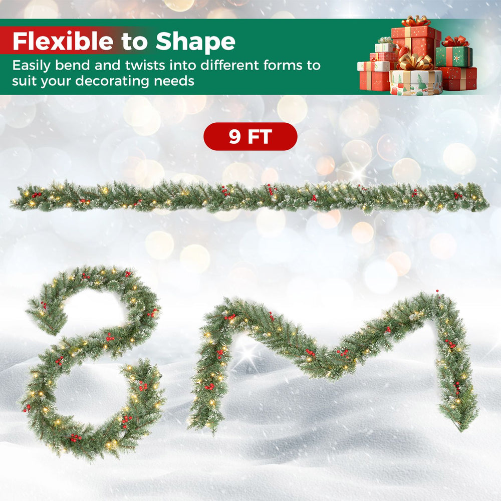 9 FT Christmas garland with frosted branches, red berries and 50 warm white LED lights for festive decorating