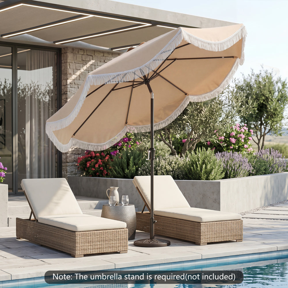9 FT outdoor tassel umbrella with a smooth crank handle, perfect for providing shade by the pool or on the patio.