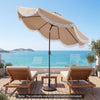 9 FT outdoor tassel umbrella with push button tilt, featuring a vented canopy for airflow, ideal for patio lounging.
