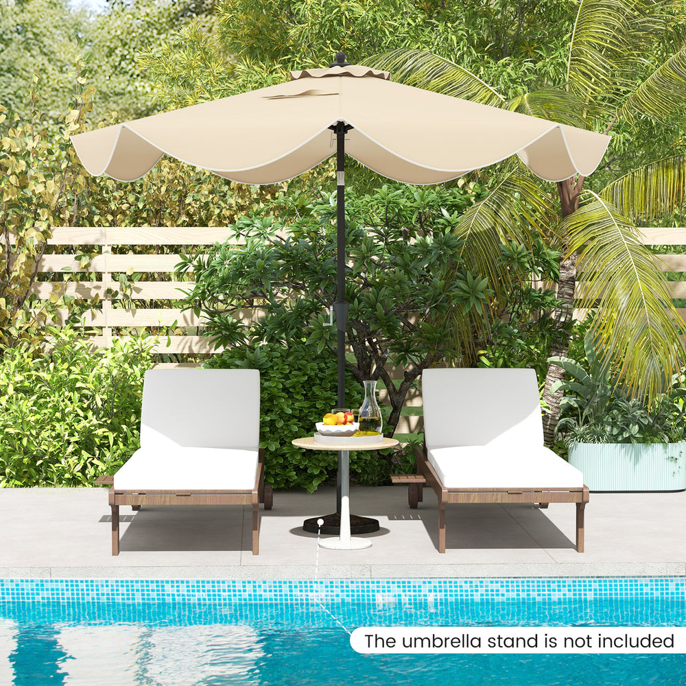 Beige 9 FT patio umbrella with crank handle and push button tilt, ideal for sun protection by the poolside.