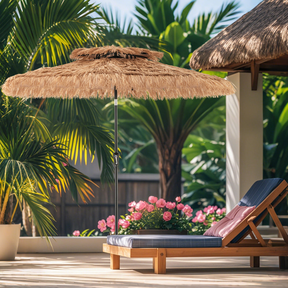 9-foot thatched tiki umbrella with 8 steel ribs, providing stylish shade for outdoor lounging by the pool.