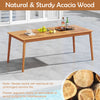 Spacious 80” rectangular acacia wood dining table with breathable fabric armchairs, perfect for outdoor patio gatherings.